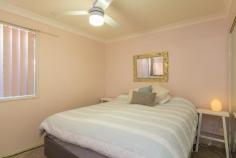  1/10A Pitt Street Coffs Harbour NSW 2450 Opposite a family friendly park and local tennis courts; this low maintenance villa in a complex of just two is perfectly positioned within walking distance to the heart of the CBD!  Brick and tile in construction; the tiled foyer provides entry into the open plan home. The galley style kitchen offers electric appliances including an upright stove plus there is internal access to the SLUG. The carpeted living/dining offers reverse cycle air conditioning and a ceiling fan. Adjoining is the north facing, fully fenced courtyard; ideal for alfresco dining. In the eastern wing of the home you will find two carpeted bedrooms both with mirrored built in robes plus the main bedroom offers a ceiling fan. Located directly between the two rooms is the bathroom and separate toilet for convenience. Additional features include: NBN connected, solar power, 250L solar hot water and inclusive laundry in garage.  This centrally located property is ideal the home for the first homebuyer, a sound asset for the Investor or the best low maintenance property for the retiree to enjoy. 