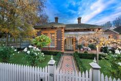  42 Dover St, Flemington VIC 3031 Enriched with opulent Victorian originality, dating back to circa 1870, “Chatham Jewel” has undergone sensitive renovations resulting in four superb bedrooms, two period bathrooms and home office. Proudly situated on a corner, within a prized plantation streetscape, it enjoys historic links to Flemington Racecourse and neighbouring Chatham Street Stables. Beyond a tuck-pointed brick façade, cast-iron lacework trimmed veranda and formal gardens, a leadlight entrance reveals grand hallway framed by towering 14 foot ceilings, corbelled archways and polished timber floors. Consummately redesigned for modern day indulgences, an extended layout comprises light filled open plan living domain, with vaulted ceilings, while French doors spill to sundrenched alfresco zones featuring resort-style salt-chlorinated, solar/gas heated in-ground pool/spa and sauna. Ensuring gourmet entertainers perform at their best a high end kitchen showcases stone counters, 900mm stainless steel Smeg dual fuel cooker, integrated coffee machine, microwave and double-drawer dishwasher. There are four charming bedrooms, three are especially grand and present open fireplaces. The master boasts walk-in-robe and ensuite with claw-foot bath. Highlights include main bathroom/leadlight, BIRS, ducted heating/cooling/split-systems, alarm/intercom and automated double garage with workshop/loft-space storage. On the city-fringe, near Pin Oak Crescent cafes, shops, trains, trams, schools and Flemington Racecourse, it’s offers exceptional lifestyle choices.  Features - Exquisite four bedroom plus home office, two bathroom solid brick Victorian home - Brilliant living domain spills to private alfresco zones set amid sundrenched pool/spa - Classic kitchen boasts 900mm Smeg dual fuel cooker, coffee machine, stone benches - Palatial bedrooms present WIR/BIRS and open fireplaces, period inspired bathrooms - Leadlight aspects, ducted heating/cooling, split-systems, automated garage/workshop - Moments to Pin Oak Crescent cafes, shops, trains, trams and Flemington Racecourse 