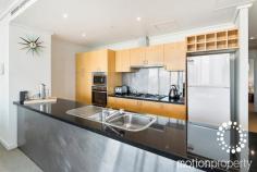  2106/14 Kavanagh Street Southbank VIC 3006 Spacious design, panoramic views and a profusion of natural light define the impressive credentials of this exceptionally spacious apartment in the heart of the Arts precinct. Boasting more than generous open plan living/dining opening to balcony along with three well-proportioned double bedrooms, each with copious storage and abundant natural light. The main bedroom at the rear of the floor plan, has a full en-suite together with a full wall of built in robes. The family bathroom includes a bath and is further complemented by a guest’s powder room. Combine all this with a separate laundry and the apartment assumes house-like proportions. No wasted space in the sensibly designed layout and the whole is a comfortable residence with a stunning aspect all just waiting for a new family to move in. Features timber/granite kitchen with stainless steel appliances, ducted heating/cooling throughout, full building security and two side by side car spaces on title. Comfortable as it is, it also offers scope to modernise and further increase the appeal. Just across the road from the new Recital Centre and on the doorstep of the Arts Centre and National Gallery you could find a whole new life about to commence. Leased until Feb 2018 at $750pw allows for a leisurely transition for downsizers with income in the short term. Inspections strictly by appointment with the agent. Robert Bromley 0433 256 298 