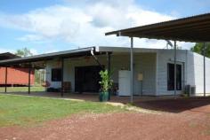 415 Livingstone Rd, Berry Springs NT 0838 Approx 160 acres on offer which is ideal for Livestock or horses. Property does have sub division potential Property has a near new comfortable modern 2 bedroom home with full length veranda and undercover parking. Sleek tiles and modern kitchen with walk in pantry and gas cooking.  Also features a guest/workers accommodation self contained with outdoor kitchen and ablutions linked by undercover area. There is also a second home ready for refurbishment plus a massive work shed with high clearance and plenty of storage. Drive your prime mover through. Chicken pen, established vegie garden and growing fruit orchard. Multiple fenced paddock options with water available. Minutes to highway and approx. 15 minutes to Coolalinga. . Comfortable modern home . Guest accommodation . Massive machinery shed/workshop . Multiple fenced paddocks . Sub division potential . Minutes to highway . Bitumen all the way . 3 Phase Power  . 10 LPS Bore 