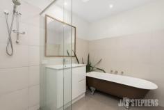  69 Creswick St, Footscray VIC 3011 The luxury of two separate living zones gives this elegant architecturally designed free standing Victorian a distinctive advantage that defines its welcoming design. Two double bedrooms that surround the bright first living room lead to a central bathroom where effective sky-lighting and a clawfoot bath enhance the impact of its impressive renovation. To the rear, the second living space incorporates open plan dining and a contemporary kitchen featuring stone surfaces, a substantial island and stainless steel European appliances. Bamboo floors and raked ceilings frame these appealing dimensions before a generous deck, private lawn, car parking via Wolverhampton Street and storage accompany the north easterly garden. Footscray Primary School, Barkly Street and transport lead the location's list of exceptional attractions. 