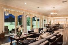  4 Willcox Avenue Prospect SA 5082 Magnificent Gentleman's Bungalow Offers Close Wednesday 23rd August 2017 at 12.30pm Unless sold prior For those accustomed to the very best, here is a rare and exciting opportunity to secure a magnificent family home of considerable substance, showcasing grand period character features matched by award winning living spaces all with a modern and stylish twist. Unparalleled in every way, from the spectacular addition (circa 2012) to the bespoke designed lavish finishes and extraordinary proportions, every element reflects elite standards. Private and secure – a sought after retreat from busy working lives that is also warm, welcoming and light with a neutral colour scheme beautifully pared by 'Black Japan' Jarrah floors, chandeliers and original working fireplaces. Accommodation is completely adaptable to family needs with up to 6 lusciously large bedrooms (4 ensuite) and a palatial master bedroom suite, serviced by a luxe ensuite bathroom and dreamy dressing room. The hand painted award-winning gourmet kitchen features marble benchtops and splashbacks, European appliances, a butler's pantry and an oversized island bench inviting friends and family to gather and celebrate everyday life. Bevelled glass café windows and large café doors allow the warmth of the north facing sun stream into the massive family hub providing a seamless indoor - outdoor flow to the entertaining pavilion. This is an entertainer's paradise, overlooking the large designer heated pool and floodlit tennis court. Fully equipped with built in BBQ, 3 door bar-fridge, ample cabinetry, built-in dishwasher and full bathroom facilities…. you will never want to leave home. Sprawling over 1500 square metres of manicured low maintenance grounds, here is a beautifully designed home of sophisticated glamour and style proudly placed in one of Adelaide's most sought-after streets, just steps from the beating heart of Prospect and excellent schooling opportunities. Special Features of this magnificent home : - Master Builders Building Excellence Award "Kitchen of the Year" in 2013, designed by Alby Turner and Son - Recent bathroom updates by The Source - Secure Cast iron fencing, electric gates & security system - Manicured established gardens designed by Maison of Kent Town  - Custom designed mouldings and archway that blend perfectly with the original part of the home, and designer light fittings throughout - Multiple family living spaces - Upstairs bedrooms serviced by laundry chute - Luxury garaging for 4 large cars with epoxy finish floor, abundant storage and access to rear of home - Solar Electrical System - Flood-lit north/south tennis court with synthetic grass, plus basketball and netball rings  Property Features Bedrooms: 6 Bathrooms: 5Garages: 4 