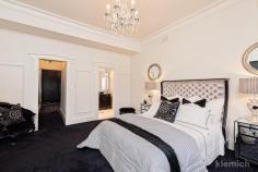  4 Willcox Avenue Prospect SA 5082 Magnificent Gentleman's Bungalow Offers Close Wednesday 23rd August 2017 at 12.30pm Unless sold prior For those accustomed to the very best, here is a rare and exciting opportunity to secure a magnificent family home of considerable substance, showcasing grand period character features matched by award winning living spaces all with a modern and stylish twist. Unparalleled in every way, from the spectacular addition (circa 2012) to the bespoke designed lavish finishes and extraordinary proportions, every element reflects elite standards. Private and secure – a sought after retreat from busy working lives that is also warm, welcoming and light with a neutral colour scheme beautifully pared by 'Black Japan' Jarrah floors, chandeliers and original working fireplaces. Accommodation is completely adaptable to family needs with up to 6 lusciously large bedrooms (4 ensuite) and a palatial master bedroom suite, serviced by a luxe ensuite bathroom and dreamy dressing room. The hand painted award-winning gourmet kitchen features marble benchtops and splashbacks, European appliances, a butler's pantry and an oversized island bench inviting friends and family to gather and celebrate everyday life. Bevelled glass café windows and large café doors allow the warmth of the north facing sun stream into the massive family hub providing a seamless indoor - outdoor flow to the entertaining pavilion. This is an entertainer's paradise, overlooking the large designer heated pool and floodlit tennis court. Fully equipped with built in BBQ, 3 door bar-fridge, ample cabinetry, built-in dishwasher and full bathroom facilities…. you will never want to leave home. Sprawling over 1500 square metres of manicured low maintenance grounds, here is a beautifully designed home of sophisticated glamour and style proudly placed in one of Adelaide's most sought-after streets, just steps from the beating heart of Prospect and excellent schooling opportunities. Special Features of this magnificent home : - Master Builders Building Excellence Award "Kitchen of the Year" in 2013, designed by Alby Turner and Son - Recent bathroom updates by The Source - Secure Cast iron fencing, electric gates & security system - Manicured established gardens designed by Maison of Kent Town  - Custom designed mouldings and archway that blend perfectly with the original part of the home, and designer light fittings throughout - Multiple family living spaces - Upstairs bedrooms serviced by laundry chute - Luxury garaging for 4 large cars with epoxy finish floor, abundant storage and access to rear of home - Solar Electrical System - Flood-lit north/south tennis court with synthetic grass, plus basketball and netball rings  Property Features Bedrooms: 6 Bathrooms: 5Garages: 4 