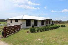  980 Texas Road Broadwater QLD 4380 10 minutes drive from town centre and you arrive at this immaculate 4 bedroom, 2 bathroom brick home on a low maintenance 5 acres, ideal for families and those looking at a bit of space. Built only 2 years ago, the interior features a lovely open plan living area with well-appointed and stylish kitchen, large master bedroom with fantastic en-suite and walk-in robe, built-in cupboards in all 3 remaining bedrooms, a spacious bathroom with separate shower and bath, separate toilet, and an outdoor area overlooking the surrounding countryside. Outside boasts 3 x 5,000 gallon rainwater tanks, a dam, and a 4 bay shed with workshop and bathroom, perfect for mechanics and also a great area for entertaining. Appealing, practical in design and with motivated vendors, this is a must-see property, so contact Simon Leigh on 0418 790 070 to arrange an inspection. Features include: -4 b/i bedrooms, en-suite and WIR off master -Open plan living area with reverse cycle air conditioning -Well-appointed, stylish kitchen -Bathroom with separate shower, bath and toilet -Outdoor entertaining area overlooking views of countryside -4 bay shed with workshop and bathroom -3 x 5,000 gallon rainwater tanks plus dam -Fully fenced low maintenance 5 acres -Built only 2 years ago Land size: 2.06 Ha (approx.)   