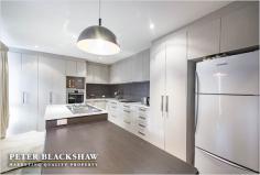  18 Cornish Pl, Holder ACT 2611 An outstanding opportunity is now available for you to secure a separately titled Willemsen designed townhouse which is superbly located at the end of a quiet cul de sac backing reserve. Boasting a unique split level floor plan that offers sun drenched living areas with the extensive use of high raked ceilings and floor to ceiling windows. The split-level dining and living area gives a sense of spaciousness, whilst the modern kitchen with island bench over looks the private front courtyard. On the lower level, the master bedroom comes complete with a walk-in wardrobe and ensuite, while the two remaining bedrooms, study and bathroom are located on the first floor.  Both the front and rear secure private courtyards are ideal for entertaining family and friends. Within a short stroll to the local shops, Cooleman Court, public transport and local schools makes this centrally located townhouse an ideal investment or live opportunity. Features Include: Separate title three bedroom townhouse  Approximately 120m2 of living space Willemsen design split-level floor plan Full-height windows in most rooms allowing an abundance of natural light Renovated kitchen with island bench top Three bedrooms, segregated master with ensuite and walk in robe Generous study area Gas heating and split-system air conditioning Electric hot water Backing reserve Easy-care secure front and rear courtyards Double carport (with storage room)  Quiet cul-de-sac location close to schools, public transport and local shops 