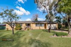  1 Judith Ave, Mount Riverview NSW 2774 This lovely brick and tile home is perfectly poised to offer a convenient lifestyle. Comprising of 3 sun filled bedrooms, polished timber floors and a great size lounge/dining room.  The layout is clever and offers three bedrooms, all with built-in robes and ceiling fans. The stunning new kitchen with stone bench tops, soft close drawers, European appliances and gas cooking overlooks the backyard and cleverly hidden laundry. The home offers split system air conditioning for year round comfort while the bathroom and separate toilet are modern and perfectly presented.  The property is on a large (863sqm approx) cnr block with a fully fenced yard and large deck, which is accessed via the kitchen. With polished floor boards, newly laid carpets in the bedrooms and freshly painted interiors this home is immediately inviting.  This home is on a highly sought after near level block > 3 bedrooms, all with built in robes, ceiling fans and flawless presentation > Stunning new gourmet Kitchen with waterfall edging leading onto large deck > Split system air-conditioning, and impeccable standards throughout > Large (863sqm approx), low maintenance flat yard  > Ample yard to enjoy, with plenty of grassed space & oversized lock up garage > Close Proximity to local shops, schools and day care centre 