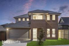  17 Mckeown Street Oran Park NSW 2570 Located in the sort after suburb of Oran Park is this brand new two storey Eden Brae home. Boasting four bedrooms in the main section of the property and also featuring a single bedroom attached granny flat ensures this property is ideal for the buyer looking for in-law accommodation, a supplementary income to rent out part of the home or perfect for the more mature buyer with older children.  - 	 Brand new four bedroom contemporary double storey Eden Brae home. - 	 One bedroom attached granny flat with own lockable access. - 	 Master bedroom featuring walk in robe and ensuite with balcony. - 	 Additional three carpeted bedrooms all with built-ins. - 	 Stylish Contemporary tiling throughout traffic areas, carpeted bedrooms and lounge.  - 	 Elegant kitchen, offering Smeg 900 mm stainless gas cooking and stone bench tops. - 	 Smeg stainless dishwasher, breakfast bar and generous fridge space.  - 	 Separate laundry with external access to side of the home. - 	 Alfresco area, built as a part of the home over looking low maintenance rear yard.  - 	 Open living area with combined living and dining room also with separate media or lounge. - 	 Ducted Air Conditioning, alarm system, with gas bayonet fitting for heating. - 	 Remote double garage with internal access and security intercom. - 	 Only minutes away from childcare's, school's and the Oran Park Shops 