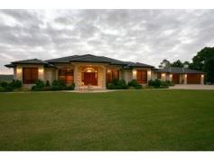  714A Maudsland Rd, Mount Nathan QLD 4211 ALLYSTONE - HORSE HEAVEN - DRASTICALLY REDUCED -DON"T HESITATE!! Seller instructs SELL. Potential for subdivision. This expansive, architecturally designed Country Manor oozes extraordinary quality, superb craftsmanship and is strategically positioned atop a gently undulating 8.39 acres of horse heaven- perfect for training, spelling & clinics.  Comprising: * 4 double bedrooms; main suite and guest wing with walk-in robes & deluxe ensuites * Library/executive study * Entertainers' kitchen with granite bench tops, glass splash backs and butler's pantry complete with commercial loading bay for catering & supplies  * Multiple, grand, open plan living spaces spilling out to undercover alfresco entertainment decks overlooking sparkling pool & edible gardens * Ducted air conditioning, vacuu-maid and solar hot water * Triple garage, 2 bay work shed  * Town water plus filtered tank water  * 8.39 acres, fenced, 1 dam, spelling yards and paddocks * Laser levelled 20m x 40m all weather dressage arena; stables; tack room with kitchen; wash bays * Lush, green grass abounds plus mature fruit trees and herb gardens with no shortage of water * Level access for horse trailers from Beaudesert - Nerang Rd * So much more.... Disclaimer: We have in preparing this information used our best endeavours to ensure that the information contained herein is true and accurate, but accept no responsibility and disclaim all liability in respect of any errors, omissions, inaccuracies or misstatements that may occur. Prospective purchasers should make their own enquiries to verify the information contained herein. 