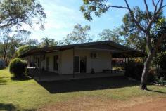  105 Brahminy Rd, Humpty Doo NT 0836 Situated 5 minutes from Humpty Doo shops and schools, this approx. 5 acre lifestyle property has something for everyone in the family. This 3 bedroom/2 bathroom home is fully tiled throughout and features an open plan kitchen, dining and living area, has split system air-conditioning throughout and has been freshly painted. The main bedroom and ensuite are situated at the opposite end of the home to the other two bedrooms. Wrap around veranda's ensure the home stays cool with the back veranda extra wide for entertaining guests whilst the children swim in the pool. A shed is situated to the side of the property and has ample room for the toys with the addition of an awning to put the boat under. The block is fully boundary fenced with an internal paddock and stables with power, lights, fans and a tack room.  Features: • 	 Solid 3 bedroom – 2 bathroom home with wrap around veranda's • 	 Approved plans available for an additional living area and bedroom. • 	 Entertaining area overlooking independently fenced pool • 	 Air-conditioning throughout with built in wardrobes • 	 Carport, Shed,  • 	 Sand arena with stable and tack room + 2 internal paddocks • 	 Irrigated gardens surround the home • 	 Conveniently located close to shops, schools, medical facilities and tavern 