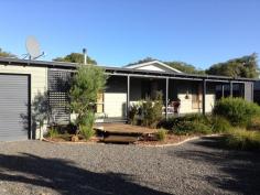 10 Jarrah Rd, Walpole WA 6398 This home is close to all town amenities and adjacent to the Bibbulmun Track and Mundabiddi Trail– enjoy a short stroll or cycle to town and the Inlet. The main house consists of 3 bedrooms, 1 bathroom, 1 WC and is open plan  living. There’s a lovely NW-facing sunroom. 1 garage, a workshop in rear of yard and there’s room for a caravan. Lawn-free, low-maintenance landscaped gardens. PLUS Fully Self-Contained Unit  This 900m2 property also includes this detached 1 bedroom 60m2 unit with verandah– ideal for a home business or studio ( let the kids enjoy the great school in Walpole). Also suitable for a holiday rental, dependant parent or friend/family stays. 