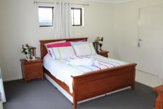  980 Texas Road Broadwater QLD 4380 10 minutes drive from town centre and you arrive at this immaculate 4 bedroom, 2 bathroom brick home on a low maintenance 5 acres, ideal for families and those looking at a bit of space. Built only 2 years ago, the interior features a lovely open plan living area with well-appointed and stylish kitchen, large master bedroom with fantastic en-suite and walk-in robe, built-in cupboards in all 3 remaining bedrooms, a spacious bathroom with separate shower and bath, separate toilet, and an outdoor area overlooking the surrounding countryside. Outside boasts 3 x 5,000 gallon rainwater tanks, a dam, and a 4 bay shed with workshop and bathroom, perfect for mechanics and also a great area for entertaining. Appealing, practical in design and with motivated vendors, this is a must-see property, so contact Simon Leigh on 0418 790 070 to arrange an inspection. Features include: -4 b/i bedrooms, en-suite and WIR off master -Open plan living area with reverse cycle air conditioning -Well-appointed, stylish kitchen -Bathroom with separate shower, bath and toilet -Outdoor entertaining area overlooking views of countryside -4 bay shed with workshop and bathroom -3 x 5,000 gallon rainwater tanks plus dam -Fully fenced low maintenance 5 acres -Built only 2 years ago Land size: 2.06 Ha (approx.)   