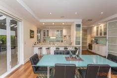  19 Hazelwood Ave, Hazelwood Park SA 5066 Auction Saturday August 19th @ 12:30pm Unless Sold Prior The tranquil life takes a breath for the better in an architectural family feat overlooking Hazelwood Park. Where your 827sqm (approx.) of boutique home, landscaped grounds, and lifestyle edges gum-studded beauty, delivering ah-moment outlooks at every possible chance. As your expansive, palm-fringed, paved driveway transports you and your bevy of friends into a share-worthy showpiece befitting a family that loves to entertain… Contemporary design begins with floating timber floors, secure garage access and the first of four bedrooms selectively separate from the rest boasting a built-in study and en suite. Beyond, open plan living and dining creates an epic interactive space with soaring, boxed ceilings, downlighting, and walls of bi-folding glass signalling social activities under the gabled pavilion. Where poolside parties will be your specialty along with all-season celebrations beneath pitched perfection, ceiling fan climate control and privacy shades. As if you need more… Reflective finishes, glass, and stainless appliances reveal a kitchen that owns its place overlooking the casual dining room, as a secondary hallway secludes the family accommodation and its shared wet areas away from activity. At evening’s end, venture upstairs to privacy on a full-floor, penthouse scale. Master bedroom majesty begins with vast sleeping, dressing, and relaxation space, ensuite with jetted spa indulgence and ample walk-in storage. And a private balcony overlooking the rear garden equals satisfaction guaranteed. Needing no further nudge into the limelight, Hazelwood Park sits amongst an enviable clutch of private and public eastern suburbs schools. Private schools include Seymour, St Peters, PAC & Pembroke to name a few; while there is proximity to gourmet shopping and dining precincts via The Parade and just a 7-minute drive to the Cellar Door at Magill Estate. But be warned, the kids will not move out when they have it all, here in Hazelwood Park. Your lifestyle includes: Hazelwood Park frontage  Architectural double level entertainer’s abode Designer finishes throughout 4 bedrooms all with built-in storage 3 deluxe bathrooms  Fully tiled 14m lap pool with in-floor cleaning system Double glass panel lift roller door Landscaped grounds & gardens Study/home office & cellar Gabled, all-weather entertainer’s pavilion Full-floor upstairs master with retreat, ensuite & spa, WIR & private balcony Rear workshop Zoning to popular schools – Burnside & Linden Park Primary, Loreto College Boutique shopping in nearby Burnside Village Some 6kms from the CBD 