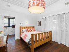  22 Market St, Guildford WA 6055 $830,000 Simply gorgeous (circa 1932) 5 x 2 brick & tile Art Deco home in walking distance to the SWAN RIVER, the Café strip, pubs, restaurants, transport, the exclusive Guildford Grammar School and only minutes from the airport & all the treats on offer in the Swan Valley. Boasting: • 	 High brick wall with electronic gates  • 	 Attractive front gardens with timber deck & seating area  • 	 Wide veranda – that perfect spot to relax  • 	 Impressive entrance with attractive Art Deco wall lights  • 	 Formal lounge with fireplace, ornate ceiling, stunning lead light window, French doors & Art Deco light fixtures  • 	 Dining room with ornate panelled ceiling, unique light fitting & lead light French doors  • 	 The timber kitchen is the hub of the home and has fitted cupboards to the ceiling, good bench space, stainless stove & dishwasher.  • 	 Private Master bedroom at the front with stunning lead light window  • 	 Three additional good sized bedrooms  • 	 Renovated white bathroom  • 	 Separate powder room  • 	 Library/Study with fitted bookshelves & lead light window  • 	 Spacious Family room with bi-fold doors to the alfresco entertaining area  • 	 Laundry and 2nd wc.  • 	 Pitched gabled alfresco area with extensive paving  • 	 Lush established gardens with veggie troughs  • 	 Cubby House & Chook pen  • 	 Powered workshop with timber shutter doors  • 	 Single garage with shopping entrance – ample off street parking  • 	 STUDIO – French doors adorned with timber shutters – sitting room, contemporary bathroom, r/c unit & gas bayonet. Additional features: High ornate ceilings, timber floors, lead light windows & French doors, some Art Deco light fittings, 4 x r/c units, electronic wrought iron gates, lush established auto reticulated gardens. Right of Way at the rear with gate to the back yard.  Side access Block size: 886m2 YOUR WAIT IS OVER! FEATURES Split-System Air Conditioning Courtyard Deck Fully Fenced Outdoor Entertainment Area Secure Parking Dishwasher Floorboards Study Workshop 