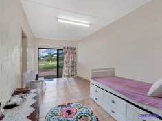  19 Cattleya Cl, Edmonton QLD 4869 Ideally positioned at the end of a cul-de-sac on a generous 700m² block in a family oriented street, this home is the perfect investment to add to your portfolio. Currently leased through a NGO, this property is receiving a very high return, with the option to either extend the lease, or to move into the home yourself instead! Stepping inside you will uncover: • 	 Three good sized bedrooms, with the Master semi-ensuite to the bathroom and with built in robe and A/C. • 	 Fourth additional bedroom is 8 meters long, with front and rear security screen and glass sliding door access, as well as access into the house – perfect for a teenager or to run a home business. • 	 Kitchen includes all electric appliances – stovetop and oven and range hood, a semi walk-in pantry, and has ample bench space and cupboards for all of your storage needs.  • 	 Bathroom features a bathtub to soak the Mondays away, and a separate W/C. • 	 Open plan living and dining areas, with an additional lounge/family room. • 	 An enormous 10mx6m shed with high clearance and drive-in access from the double gates. • 	 The long driveway and separate carport provide plenty off-street parking. • 	 Rain water tank to help cut down on your bills. • 	 Internal Laundry with shelving. • 	 Large outdoor deck is perfect for winding down in the afternoon and overlooking the mountainous views, or for entertaining your guests. • 	 Fully fenced and security screens throughout. • 	 Established fruit trees include lychee and pawpaw, along with other tropical trees and colourful flora. Whether you decide to move in and unpack, or add to your portfolio as a great investment, the choice is yours. This home is situated just a short walk to Supermarkets, Sugarworld Water Park, a gym, fast food restaurants, parks and public transport, and only 15min drive to the CBD. Inspections by appointment only, so call today to have a look for yourself; and submit an offer while it’s still available! 