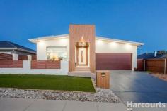  30 Mollie Dyer St, Bonner ACT 2914 $829,000 + Located in one of Canberra's hottest growth suburbs; Bonner, you will find this stunning and spacious four-bedroom home that will tick all the boxes. Offering modern living on a spacious 557m2 parcel of land this home provides the astute buyer with all the modern luxuries and quite a few extras. This immaculately presented property is bathed in natural sunlight and is equipped with four spacious bedrooms and three separate living areas which will please growing families. Located perfectly close to shops, schools, public transportation, parks and only a short drive to the new Amaroo shopping centre and the Gungahlin shopping centre. Features include: - 	 5KW Solar Panel System - 	 8 Security cameras - 	 Spacious bedrooms - 	 Master bedroom with en-suite and walk in wardrobe - 	 Separate dining area - 	 40 mm Island stone benchtop, 900 mm SMEG gas cooktop and oven, glass splashback, ducted range-hood, Fisher & Paykel double drawer dishwasher in the kitchen - 	 Three separate living areas - 	 Ducted reverse cycle heating and cooling - 	 Alfresco with gas bayonet - 	 Full length tiles and tub in bathroom - 	 Three step cornices - 	 Low maintenance garden - 	 NBN connected 