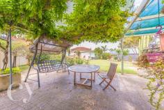  8 Battrass Place, Innaloo, WA PRIME R40 DEVELOPMENT BLOCK Tucked away at the end of a quiet cul-de-sac this prime development block is awaiting the astute investor.  Zoned R40, 8 Battrass Place Innaloo offers 969m2 of land proudly set on the high side of the street with a Northern rear aspect.  But if you prefer just to buy and move in then it would make a wonderful home too.  On driving up you can tell it has been a loved home for decades. The wide green lawn and mature roses offer a warm welcome. And the natural bird life keeps a continual song in the air.  The front porch is perfectly set so you can keep an eye on the kids playing in the nearby park or sit back and relax on a balmy Summers night with a refreshing drink..  Inside the 3 large bedrooms, study, lounge and kitchen/ meals offer great separation for a couple or young family. And the hard work has been done in the recently renovated bathroom.  But I think the jewel in the crown is the wonderful backyard - complete with a large paved courtyard shaded by a wisteria covered pergola. Endless BBQ's could be had with a front row view of the best backyard cricket pitch.  The beautilful rose beds bring a perfume second to none - and the 3 large sheds provide a santury for the most avid tinkerer.  There is so much more to see and I welcome you to inspect.  
