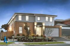  56 The Range Boulevard, Croydon, VIC 3136, Australia Glamorous Meets Grandeur $1,230,000 - $1,350,000 First class lifestyle within the elite and exclusive Range Estate.  - Proudly introducing this sophisticated residence providing approx. 48 squares in total, around two years young.  - The dynamic interior features a very impressive entrance hallway which sets the tone for the scale of this fabulous home.  - A study or home office option, lounge room, generously sized first or guest bedroom with a modern ensuite. - Designer, high end kitchen connects effortlessly with the dining and family zone merging with the spacious leisure room opening onto the covered alfresco retreat and easy care garden. A spacious Bulters pantry adjoins the kitchen. This magnificent informal zone is the heart beat of this home.  - A powder room and good size laundry completes this lower level.  - Upstairs showcases the living room with private balcony enjoying expansive views towards the Dandenongs, a stunning view enjoyed from many rooms of the home. - Offering four additional generous bedrooms, all with WIRs, another ensuite, incorporating the indulgent main bedroom with a sumptuous ensuite. 