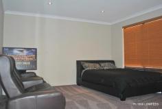  139 Ashley Rd, Tapping WA 6065 $540,000 From the moment you step through the double door porcelain tiled entrance you will be impressed with the neutral decor of this very large four double bedroom family home.... + Master bedroom extra large with walk thru clothes closet, en-suite with his/her basin and separate WC + Movie enthusiasts will never leave the Theatre room with french doors + Study/play room tiled + The home chef will be happy every day with the enormous sized kitchen with breakfast bar,dishwasher, generous walk-in pantry,shopping drop zone,shoppers' entrance + open plan family room - sliding door to alfresco with timber look decking + Four double size bedrooms all with walk-in-robes + Bathroom with bath,basin and shower + Laundry with bench top and huge storage/linen cupboard + Ducted air conditioning + Insulated + Double remote garage with roller door access to rear House benefits from 608m2 Block, GHW system, alarm, 3x3 Garden Shed, built 2007, Automatic reticulation, Very private back yard with high fence and last but not least... a piece of resistance................    a child's cubby house thrown in with the sale...  Call Lolla 0419043293 BEFORE IT IS TOO LATE!! + This lovely family home is close to Joondalup Shopping Complex and train station, freeway, beaches, taverns, schools, Donnelly Pk. Banyandah Pk. and Neville Pk. 