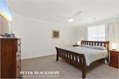  22 Tsoulias St, Gungahlin ACT 2912 $739,000+ Perfectly positioned opposite parkland and only minutes to the Gungahlin Town Centre, Flemington Road, Horse Park Drive and the Light Rail is this 4 bedroom plus ensuite family home.  The clever and contemporary floor plan for 22 Tsoulias Street maximises light and space, while kitchen invokes a sense of grandeur and is the heart and soul of the home. It is understated in elegance but does not compromise on functionality, featuring a stainless steel Electrolux oven, Omega induction cooktop and stainless steel Fisher and Paykel double dish drawer. The north facing undercover alfresco is the perfect haven for entertaining large family gatherings and overlooks private and established gardens. Very generous in size is the main bedroom which includes a reverse cycle air conditioner, walk-in robe, ceiling fan and ensuite, while the remaining 3 bedrooms which are generously proportioned also include built-in robes and ceiling fans. Completing this wonderful home is the double garage with remote and internal access and family sized laundry with a built-in storage plus the comfort of ducted gas heating throughout. Conveniently positioned within walking distance to the Gungahlin Town Centre, restaurants, cafes, Gungahlin College, medical centres, public transport and within easy access to Horse Park Drive and the Gungahlin Drive Extension. An inspection of this magnificent home is highly recommended to truly understand the lifestyle on offer. Features: - Block: 470m2 - House: 218.2m2 (Living: 181.17m2 + Garage: 37.03m2) - 4 bedrooms - Main bedroom includes walk-in robe, ensuite, split system, ceiling fan - Built-in robes and ceiling fans to bedrooms 2, 3 & 4 - Main bathroom with spa bath - Separate toilet - Lounge room and dining room - Living area and meals area - Reverse cycle split system to living area - Laundry with access to rear - Ducted vacuum - Ducted heating - Undercover entertaining area - Automatic double garage with internal access 