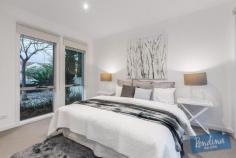  1/79 Mitchell Street Maidstone VIC 3012 Showcasing awe-inspiring architectural design, quality finishes and high end appointments, this handsomely proportioned three bedroom, two bathroom residence delivers discerning family home buyers and city professionals a sophisticated easy living environment. Boasting individual street frontage, the property is further enhanced by its close proximity to Highpoint’s retail, dining and entertainment hub, whilst zoning for Maribyrnong College is an added bonus. Step inside to a spacious open plan living zone incorporating a light filled meals space, central kitchen and a brilliant lounge area set beneath towering double height ceilings. Large glass aspects bring the outside in and ensure easy passage to a private courtyard where relaxing, entertaining and alfresco dining is certain to become a regular past time. Upstairs a mezzanine retreat is ideal as additional living/study space. While well equipped with stainless steel appliances, two-tone cabinetry, large pantry and stone counters, the kitchen’s main focal point is a huge island bench ensuring appeal for gourmet entertainers. Complementing two bedrooms are built-in-robes. A downstairs main boasts walk-in-robe and ensuite, and courtyard access. Additional highlights include luxury bathroom, powder room, ducted heating, split-system and automated garage with direct entry. With Flemington Racecourse, Melbourne Showgrounds, café strips, transport and the CBD all nearby. Features - Architecturally inspired three bedroom, two luxury bathroom residence - Stunning living domain with double-height ceilings and mezzanine retreat - Open plan kitchen showcases huge island bench, stainless steel appliances - Generous bedroom/BIRS, ground level main has WIR/ensuite, powder room - Private alfresco courtyard, ducted heating, split-system, automated double garage - Close to Highpoint shopping/entertainment precinct, schools and transport 