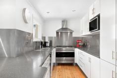  18 Creslin Terrace, Camden Park SA 5038 $595,000 When the essence of 1920’s charm meets a modern renovation in a popular location close to Glenelg, Immanuel College and overlooking the green belt of the Westside Bikeway – you’ve struck family gold. Stemming from its rose-scented gardens and rendered façade, undeniable bungalow beauty takes hold – leadlight entry and wood floors underfoot to darting eyes over decorative fireplaces and sky-high ceilings – it’s magic. This home has a lot to say about style and entertaining with versatility of up to four bedrooms (or two living rooms) and a landscaped, north-facing garden oasis. Relaxed informal space for TV and winding down, or an adjoining area equally at home as a fourth bedroom or formal dining? Go with what your family craves right now. As plantation shutters and downlighting add irresistible complement to character, the shiny galley kitchen upgrade does too. Stainless freestanding oven and splashbacks add sheen to the crisp finished décor, and French doors to your adjoining casual dining let more of that north-facing light in. Cue events here if the rear garden is any indication–it’s impressive. This gabled, all-weather entertainer is swathed in paving with lawns edged by soldiering palms. And when there’s room for play, dining and lounging afterwards, you’re winning. With a bathroom that nails looks, modern flair and functionality you keep winning. The exquisite suite of powder white with a punch of neutral tones (and bubbling spa) says fine style indeed. At day’s end, it’s all you need as you happily collapse in either of the generous front bedrooms–be it the master with robes and decorative fireplace, bedroom two across the hall with wall-length robes, or the sunny third enjoying rear garden views. There’s a lot to love locally; Glenelg needing no introduction, Cross Road and Anzac Highway as your shopping, city, or coastal gateways for fun in the sun. Creslin Terrace has all the family credentials. Highlights: C.1920 Renovated Bungalow retaining classic features Manicured 561sqm (approx.) allotment facing a reserve Up to 4 bedrooms North-facing rear alfresco entertaining Renovated bathroom with spa Ducted evaporative air conditioning Ducted gas heating 3 R/C split systems Renovated kitchen with freestanding, stainless steel oven Working fire place in the lounge room Security system Double length drive-through garaging Large rear shed for 2 cars (or workshop) Minutes to Immanuel College Ride the Westside Bikeway to Glenelg 