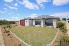  37 Hyden Loop, Dawesville WA 6211 $495,000 Comfortable family home with quality fixtures and fittings throughout. Spacious 4 bedroom 2 bathroom brick and colorbond home on the high side of the street and situated between the estuary and ocean. This well designed family home was built by Home Group WA will surely impress you. The home has a large wide front door with a security flyscreened door giving good security and providing the sea breeze to cool the home off quickly during the hot summer days. The entry hall is generous in size and has direct access to the double garage which has extra storage space making this area very handy for storing tools, bikes and gardening equipment. There is a rear roller door which gives access to the backyard. The home has a separate theatre room with double doors and a separate wing for the 3 Queen size size children’s bedrooms, all with built in robes, main bathroom ,separate powder room,walk in linen cupboard and study. The open plan living area is tiled and has a gorgeous chef’s kitchen with stone bench tops, 900mm stainless steel electric oven and gas hot plates, dishwasher, stainless steel range hood, dishwasher and walk in pantry. The laundry is generous in size and convenient to the kitchen. The master bedroom is situated at the rear of the home with ensuite bathroom and walk in robe. A sliding door leads out to the alfresco area from the main bedroom. There is a large fabulous size alfresco area under the main room with a bonus powder room. Other features include: Ducted reverse cycle air conditioning, insulation, 5 kw solar panels, gas instantaneous hot water system, LED lighting throughout, reticulated gardens with extensive limestone retained garden beds, concrete double driveway, grassed front yard with limestone retaining wall with ocean view outlook. This home is convenient to the Dawesville Shopping Village, Ocean Road Primary School and Saint Damien’s Catholic Primary School, Port Bouvard Sport and Recreation Club Surf Lifesaving Club, The Cut Golf Course, Dawesville Channel, boat ramp, Restaurants, Marina and public transport. 