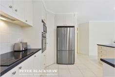  22 Tsoulias St, Gungahlin ACT 2912 $739,000+ Perfectly positioned opposite parkland and only minutes to the Gungahlin Town Centre, Flemington Road, Horse Park Drive and the Light Rail is this 4 bedroom plus ensuite family home.  The clever and contemporary floor plan for 22 Tsoulias Street maximises light and space, while kitchen invokes a sense of grandeur and is the heart and soul of the home. It is understated in elegance but does not compromise on functionality, featuring a stainless steel Electrolux oven, Omega induction cooktop and stainless steel Fisher and Paykel double dish drawer. The north facing undercover alfresco is the perfect haven for entertaining large family gatherings and overlooks private and established gardens. Very generous in size is the main bedroom which includes a reverse cycle air conditioner, walk-in robe, ceiling fan and ensuite, while the remaining 3 bedrooms which are generously proportioned also include built-in robes and ceiling fans. Completing this wonderful home is the double garage with remote and internal access and family sized laundry with a built-in storage plus the comfort of ducted gas heating throughout. Conveniently positioned within walking distance to the Gungahlin Town Centre, restaurants, cafes, Gungahlin College, medical centres, public transport and within easy access to Horse Park Drive and the Gungahlin Drive Extension. An inspection of this magnificent home is highly recommended to truly understand the lifestyle on offer. Features: - Block: 470m2 - House: 218.2m2 (Living: 181.17m2 + Garage: 37.03m2) - 4 bedrooms - Main bedroom includes walk-in robe, ensuite, split system, ceiling fan - Built-in robes and ceiling fans to bedrooms 2, 3 & 4 - Main bathroom with spa bath - Separate toilet - Lounge room and dining room - Living area and meals area - Reverse cycle split system to living area - Laundry with access to rear - Ducted vacuum - Ducted heating - Undercover entertaining area - Automatic double garage with internal access 