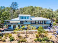 34 Hidden Ct, Kingsholme QLD 4208 AUCTION ONSITE Saturday 18th Nov 12:00pm A lot of work has gone into this luxurious 3.2 acre Property, creating space for the kids & pets along with landscaped fruit trees and beautiful natives. Stunning views while you soak in the In ground Spa Timeless hard wood polished floors Lovely combustion fire place Ducted air-conditioning Turn wood timber features 3 water tanks that hold in total 85,000 Litres Huge 3 bay American barn style man cave with 3 phase power that fits 9 cars easily. Call John today or see you at the Open Home. 