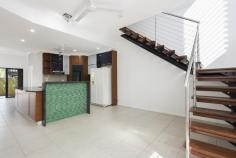  4/18 Annear Court Stuart Park NT 0820 $585,000 The "WOW" factor is predominant in this townhouse with 306sqm under title. The entrance draws you into the expansive downstairs interior that flows seamlessly through a concertinaed window wall of glass onto the large rear courtyard that has private access to the downstairs bathroom (3rd bathroom). The modern kitchen with stone benchtops incorporates a cocktail bar finished in green glass and is the splendid pivotal point between the living and dining areas. A 2nd intimate living space is situated upstairs where glass doors unite the indoors with a sea breeze bathed balcony. The master bedroom with ensuite bathroom has private access to the balcony as well. The 2 other bedrooms share the main bathroom, and the 2nd bedroom also has its own private balcony. Featuring an amazing amount of defined living space: 3 living areas, 3 bedrooms, 3 bathrooms, 2 balconies, and undercover parking for 3 vehicles, so bring the boat. Dedicated to making your lifestyle complete pets are also welcome on application. Having recently been painted, electrical, vanities and tapware upgraded this superb townhouse is waiting for a new owner. Located in the Tipperary Waters Marina Estate it is only minutes to the city and walking distance to the local shops and restaurants. 