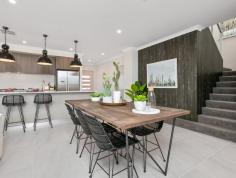  12 Gooljak Rise Lakelands WA 6180 The light and bright contemporary elevation is finished in neutral tones with gentle splashes of colour and a feature brick column in warm white for visual texture. A separate theatre room overlooks the streetscape to the front of the home, with the open plan Kitchen, Dining and Family areas tucked neatly behind. The walk in pantry is discretely positioned opposite the end of the island bench offering ample space & shelving, with the Laundry and Walk in Linen accessible from the Kitchen for ultimate convenience. Three good sized rear bedrooms are positioned off a rear wing – two with walk in robes, and the third with its’ own entrance passage and double sliding robe. The beautifully appointed upstairs Master Retreat with its own lounge, ample walk in robe and Ensuite with double vanity, presents more like a private studio than a bedroom. Located just 10 minutes (approx.) from Mandurah’s vibrant town center and marina, Lakelands is the perfect choice for anyone seeking a family-oriented community with an outstanding list of attractions on your doorstep. 