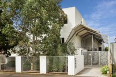  4/9 Sandown Road Ascot Vale VIC 3032 $700,000 Moments to Showgrounds Village and Union Road cafes, this beautifully presented, three bedroom, two bathroom townhouse, one of only five, offers new buyers and investors comfort, security and convenience. A delightful open living domain (split system) spills to a private courtyard which requires little maintenance. Together with a sleek modern kitchen boasting stone bench tops, glass splashbacks and a full complement of Smeg appliances, entertaining will be inspired. Three double bedrooms are all completed with BIRs and split system air conditioning units, the master also boasting an intimate balcony. A contemporary bathroom on each level assures ultimate convenience, both presenting stone topped vanities and heated towel rails, one also with bath and separate shower. Additional noteworthy features include undercover parking for two vehicles, storage cage, European laundry plus secure gated entry.  