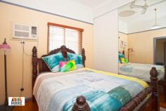  4 English St, South Mackay QLD 4740 $320,000 This beautiful, traditional Queenslander will be the serene property your family has been searching for, & so close to town & schools! Polished timber floors, engulfing natural light & expansive high ceilings immediately transform the outside hurry-&-bustle into a flowing place of calm & relaxation. The oversized, open plan kitchen, lounge & dining are all located in the central hub of the home & the casement windows open out on to the massive timber deck, providing a dream come true for entertainers who enjoy easily looking after their guests. All four bedrooms upstairs are large with built ins, fans & air conditioning. There is also potential for a large ensuite & walk in robe to be created from the main bedroom. Downstairs is a blank canvas, allowing you to add value & do what you wish with the space - two cars can comfortably fit in tandem; the enclosed room could act as an office or a rumpus room. The best part about this property is the natural-tree canopy over the massive back yard, equipped with self-watering greenhouse, swings & climbing apparatus! With a 1051m2 block, the mind boggles at the potential this High-Density Residential block permits - future subdivision, unit complexes, additional dwellings ... all evidence that this property would be a very wise purchase! Disclaimer: The vendors and/or their agents do not give any warranty as to errors or omissions, if any, in these particulars, which they believe to be accurate when compiled. Prospective purchasers should satisfy themselves by inspection or otherwise as to the accuracy of the particulars. 