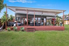  67 Wyuna Rd, Tweed Heads West NSW 2485 $795,000 -$825,000 OPEN TO INSPECT SATURDAY 11TH NOVEMBER 9:30 - 10:00AM NSW TIME  Hidden down a long private drive, you will land on shore at this trendy (4) bedroom low set contemporary residence aloft a 885m2 absolute waterfront allotment.  KEY FEATURES:  - Open plan air-conditioned living w/ cool timber flooring  - Master bedroom w/ ensuite  - Sociable hostess kitchen w/ island bench, cml size oven w/ gas hot plates  - Bi-fold doors, plenty of glass & louvers  - Large covered entertainers deck overlooking the water  - Double carport & storage  DETAILS:  Rates - $3,082.05 per annum  Water Rates - $TBA  Market Rent - $650 per week  LOCATION:  Your new waterfront abode is located on the fringe of Kirra and therefore you can enjoy the benefits of local cafes and major shopping at a moment's notice.  For beach lovers and surfers, you can have your toes in the sand at Kirra, Snapper & Greenmount (to name just a few) within (7) minutes.  AGENT'S COMMENTS:  A delightful home with a real personality that comes to life as soon as you walk through the front door.  If you are looking for a property with a difference then this is it.  * Please note the boat ramp belongs to your neighbour ' 