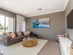  14 Dalby Street Hilbert WA 6112 A stunning display home featuring such clever functionality, with a master suite tucked away from the street for absolute privacy, three ample minor bedrooms with double built-in robes and a separate theatre or perhaps an adult retreat, to the front of the home – overlooking a leafy streetscape. Enjoy the full view of your professionally designed landscape with windows almost the entire rear width of the home overlooking an entertainer’s alfresco, seamlessly integrating with the open-plan living and kitchen space. 