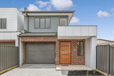  1/22 Ferndale Road Sunshine North VIC 3020 $660,000 A first-class fusion of light, luxury & family friendly spaciousness. Designed for a quality low-maintenance private lifestyle, the house-sized layout is sleek, streamlined & incorporates an expansive area of living, dining & entertaining which flows onto the north facing backyard. The well equipped kitchen is fitted with stone bench-top central island bench/breakfast bar with quality stainless steel appliances and includes a dishwashers, fenced private driveway with remote panel lift garage door and direct internal garage entry. Upstairs are 3 good sized bedrooms, all with built in robes, main bedroom with fully ensuite with his and hers basins while bedroom 2 and 3 share the main bathroom each with their own separate door access and including bath. Further features include – 4 split heating and refrigerated cooling systems, timber stairs and hand rails, ceramic tiled floors to total lower level, 3 toilets, under-stair case storage, NBN provisions, security alarm system, fully camera intercom door bell, water tanks, garden shed, landscaping plus more. A very affordable opportunity to be part of this popular neighborhood with local schools, bus stops, many local strip shops and parks all close by Features Air Conditioning Alarm System Built In Robes Intercom Carpeted Close To Schools Close To Shops Close To Transport Heating Kitchenette 