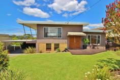  10 Seaview Ave, Merimbula NSW 2548 $728,000 Commanding an elevated & central position in Merimbula with panoramic “never to be built-out” views sweeping over the ocean, bay, lake, stretching to the mountains.  This home has been tastefully renovated while retaining its original charm. This impressive tri-level 4 bedroom home boasts spacious formal and informal open plan living areas opening to a large balcony  capturing the breathtaking views. The well appointed modern kitchen features a rock-solid benchtop and s.s. appliances. Beautiful polished timber floors are a feature of the home. The generous master bedroom also enjoys the wonderful views and has a large walk-through robe to a luxurious ensuite with spa bath. Two bedrooms are accessed at the entry level which includes a high-end bathroom with an oversize shower. The 4th bedroom is downstairs and has its own separate entrance, vanity and toilet. It opens to a covered deck – this room could also serve as a rumpus or guest accommodation. The property is beautifully landscaped and has a large double carport.  The backyard has a BBQ/entertaining area and backs onto a reserve that extends through to the lake & boardwalk. Offering modern amenity, amazing views, privacy and convenience to town this property is not to be missed!    Features Balcony  Verandah  Outdoor entertainment area  Fenced  Smoke Alarms  Ocean views  Inside Spa 