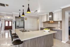  2 Aurina Drive Hidden Valley VIC 3756 $750,000 - $800,000 Positioned opposite the Hidden Valley Golf Course, this house has some of the best views in the area. With four large bedrooms, master with full ensuite and spa bath and dual WIRs, second also with ensuite and WIR and 3rd and 4th with WIRs this house has that extra touch of luxury. The formal lounge and dining is complemented by the modern and fresh kitchen and adjoining theatre room, living area and under-roof inside/outside alfresco area. The beautiful solid timber staircase leads up to the four spacious bedrooms and an extra family/TV area. A good sized study, and large laundry with a huge linen press, under stair storage, ducted vacuum, and solar panels, all add to this house which is a credit to the current owners and is kept in beautiful condition. This large 1000m2 block means there is ample room for caravans or for entertainment or for the kids to play. 