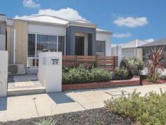  29 Bellini Gardens, Alkimos WA 6038 $319000 Why build when you can buy this near new property? Or are you down-sizing, a new home buyer or potential investor? If so you must not miss the opportunity to view this immaculate easy to maintain 3 bedroom home.  The property is situated just 100 meters from Alkimos primary school, and close to parks and playgrounds, the beach, only a short drive to Butler train station, and an approximate 10 mins walk.  It is close to Butler Central which will be opening soon. It is also in close proximity of the Trinity Shopping Centre currently being developed on the corner of Marmion Avenue and Santorini Promenade.  With the Northern Freeway now reaching Hester Avenue it is only a 15min drive to the Joondalup shopping centre and approx. 35 minutes to the city. Some of the features are: Built 2014 Corner lot house  Reasonable sized neat and tidy paved backyard area 3 bedrooms (WIR in Master, Built-ins in bedrooms 2 and 3) Ensuite to Master Family Bathroom Kitchen/lounge/dining Theatre Room Air conditioning in lounge and Master bedroom Security Alarm Garage with remote control This property will sell quickly so act now and give Kathy Sharp a call on 0414 549 190 to arrange a viewing. 