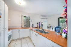  21/24 Amsonia Court Arundel QLD 4214 $330,000 Positioned at the end of the complex - Very private - Priced reduced for quick sale. As one of the highest income earning units in the complex offering an attractive return OF $410 PER WEEK and substantial tax advantages, this villa, complete with current long term reliable tenants on a till June 2018 is an astute investor's delight. would also suit the Qwner Occupier if you are happy to wait till end of lease.  Features:- - Secure gated entry. CCTV plus on-site management - Privately positioned at rear of complex. Garden entrance - Spacious air-conditioned dining, lounge & rumpus area - Central kitchen with breakfast bar. Feature glass atrium - Sliders to large rear garden & grassy bbq/kid's play area - Master bedroom/garden view/spacious robes & ensuite - + 2 large light-filled bedrooms. Expansive built-in robes - Family bathroom/shower & bath. Separate toilet. Laundry  - Fans & large windows with vertical blinds throughout  - Linen press/storage. Double garage with internal access - Excellent recreation facilities - pool, spa, bbq area etc.  - Close to schools, shops, transport, the Motorway & amenities This desirable property in a well-regarded locale is located close to schools, golf courses, two major shopping centres and the Gold Coast theme parks. It's also just a short distance from the Helensvale Railway station, the M1 freeway, the Southport CBD and Griffith University.  Imposing high entry gates, on-site management and CCTV secure the entry to Meadowlands "The Terraces", one of three meticulously maintained neighbouring, complexes on the Queensland Gold Coast specifically created for the investor with almost all of the 86 low set residences occupied by tenants  Our vendor is offering a well maintained unit with a private garden entrance, double garage with internal home entry and a spacious family living area wrapping around a compact kitchen with breakfast bar. This air-conditioned area incorporates a dining section, lounge area and study or rumpus space, all conveniently supervised from the kitchen, spilling out through sliders to a grassy rear garden- a barbeque, family fun and children's play area. Sliding doors also connect the dining area to a small atrium. There are three large light-filled bedrooms with fans and sliding robes including the master bedroom with its own ensuite plus a family bathroom with bath and shower, a separate toilet and a laundry. On site recreational facilities including a large fully fenced swimming pool with terracotta paved surrounds and recreation area, a spa, spacious tiled under-cover electric barbeque and a function room. Shared facilities with a close-by sister complex include duplication of all of the above as well as a gymnasium, sauna and a children's playground.  Council Rates per annum approx. $1,622 Water approx. per quarter $234 Body Corporate approx. per quarter $1,169 approx. $90 per week.  
