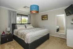  18 Edmonton Place, Kingsley, WA 6026 Spacious Family Living in Woodvale Secondary College catchment area This spacious family home sits on a 710sqm block and falls within the Woodvale Secondary College catchment area. With four good sized bedrooms, study and separate living and entertainment areas, you have found yourself a wonderful family home.  The master suite is of good size and has a beautifully renovated ensuite, there is a study at the front of the home, which would make the perfect home/office. Gather the family around and enjoy preparing meals in your fantastic new kitchen, it is spacious and has all the latest mod cons, with a servery from the kitchen straight into the patio area even entertaining is made easy. This home has it all, separate games/theatre room, ducted reverse cycle air conditioning, powder room, Low maintenance outdoor area that is multi functional and has plenty of space, 3kw Solar panels (12), three sheds and so much more, so if it's space you are looking for, then look no further this is the home for you. 