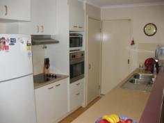  6 Torrisi Terrace, Stanthorpe QLD 4380 $375,000 In a  sought after residential area of Stanthorpe amid  other quality residences is this low set brick home just 12 years old and in immaculate condition. It offers 4 bedrooms ( or 4th study) all built in, main with ensuite and walk in robe. There is a separate lounge and an open plan casual living/dining with a wood heater plus an effective 4.5kw air conditioner. The adjoining electric kitchen with dishwasher has direct access to the double garage with remote control doors. Property has full security screens too and 3kw/350 litres solar hot water. The main bathroom has sep bath, sep shower, sep toilet and the nearby laundry has direct rear access. There is a delightful private N/E facing under cover casual area -  ideal for all year use PLUS a separate covered BBQ area which is also great for a family area/hobby space or just a get a way! Near this is another L/U garage for vehicle/mower/trailer/ workshop etc. There are 2 tanks, 2 pumps PLUS all town services and the property is fully fenced (colorbond) and has most attractive established gardens set on easy care generous 997m2. Nothing to do ....property and position are excellent....an ideal quality residence to appreciate NOW. Asking $375,000. Call Anne Lindsay on 0418 737309. 