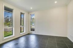  36 Hebe Terrace Glenfield NSW 2167 $829,999 Perfectly positioned in the ever growing and sought-after suburb of Glenfield is this brand new family home. It is sure to impress with its intelligent design and high end inclusions. Set on a good sized block with features that include:  • 	 Master bedroom with walk-in & ensuite • 	 3 bedrooms all with built-ins • 	 Formal Lounge  • 	 Modern kitchen with stone benchtops and stainless steel appliances • 	 Combined dining and family room  • 	 High 9ft ceilings • 	 Tiled downstairs and carpeted upstairs  • 	 LED lighting throughout • 	 NBN ready • 	 Modern bathroom tiles to ceiling  • 	 Ducted reverse cycle air conditioning • 	 Large undercover outdoor entertaining area  • 	 Remote lock up garage  This property has too many features to mention and is in close proximity to a host of all amenities including Crossroads Homemaker Centre, M5 motorway, Glenfield Station and local schools. Call ONE AGENCY CARNES HILL for your inspection. 