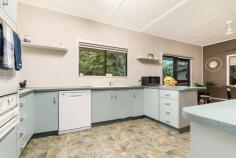  9 Burden Pl, Millner NT 0810 OPEN FOR INSPECTION Sat 17 Feb, 12:00pm - 12:30pm  Tue 20 Feb, 5:00pm - 5:30pm Situated in the family friendly and centrally located suburb of Millner, this property is on a large 891m2 established and securely fenced allotment. Offering a fantastic five bedrooms and two bathrooms this elevated home is in a quiet court. So close to quality schools, Rapid Creek Sunday markets, stunning foreshore reserve, Jingili Water Gardens, Airport, Casuarina shopping centre, University and just a short commute to the CBD. Make this a home to inspect! • 	 Three bedrooms upstairs, two downstairs • 	 Classic elevated design with huge wrap around balcony • 	 Spacious lounge with separate dining area • 	 Kitchen with electric cooking, dishwasher • 	 Built in robes to all upstairs bedrooms • 	 Bathroom with bath, separate toilet • 	 Timber flooring and Air conditioned throughout • 	 Bedrooms 4 & 5 downstairs • 	 Storage and undercover entertaining • 	 Established reticulated yard including fenced spa • 	 Heaps of room for boat, trailer or caravan • 	 Very quiet no through street – Ideal for families This property would be ideal for the large family with the bonus of having two bedrooms and a second bathroom downstairs, as well as undercover entertaining. Currently downstairs is used as extra income with both rooms being tenanted for approx. $150pw each. Upstairs the classic design features a large wrap around balcony with access from the lounge, dining and two bedrooms. Inside the house features timber flooring and air conditioning throughout. Each bedroom is a good size and has mirrored built in robes. There is a large open lounge, separate dining area and kitchen with electric cooking and dishwasher. If not sold prior, this home will be auctioned on Tuesday the 27th February @ 6pm on site. Bidding Guide: Bidding to start at $500,000 Status and Pest Reports Available on request Size on title: 	 891m2 Council Rates: 	 $1,680 p/a 