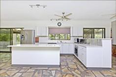  35 Koel Way, Howard Springs NT 0835 $650,000 Immaculate 3 Bedroom, one bathroom ground level painted block home with beautiful N.T slate floors on 2.5 acres located in a cul-de-sac Open plan living featuring new kitchen with plenty of  cupboard space and built in dishwasher. Main bedroom has air conditioning , 2nd bedroom also air  conditioned with another split air conditioner in the living  areas. All bedrooms are carpeted and there are built in robes  in two bedrooms  Large modern bathroom with separate toilet. 8mtr x 8mtr lock up shed & garden shed. Granny flat bedsitter with ensuite bathroom. Dual carport 20,000 litre chlorine plunge pool alongside timber floored, shade cloth covered pergola area set amongst beautiful private gardens & lawns There are assorted fruit trees for family indulgence including mango & lemon.  Double carport parking , town water, power and fencing to this property add extra appeal to make this a great family rural package With it's handy proximity to Humpty Doo amenitiesthis immaculate family home on acreage is only 5 mins from Palmerston and 20 mins from Darwin CBD 
