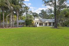  25 Tadmore Rd, Cranebrook NSW 2749 INSPECTION TIMES Saturday 24th February  02:00am - 02:30am When only the best will do.....  This majestic property on five level flood-free acres with town water is graced with two contemporary homes (dual occupancy approved) in a very private location in the exclusive suburb of Cranebrook. The main residence is a 4 bedroom architect-designed resort-style home with a grand, palm-tree avenue entrance and is surrounded by stunning tropical gardens and lawns, sealed pathways and a circular drive.  The entire home is filled with natural light thanks to the multiple sky lights, glass sliding doors and large windows, enhanced by ultra-modern timber plantation shutters and venetians. With large open-plan living areas and quality tiled floors throughout, it has the bonus of being designed to facilitate wheelchair access, and the needs of the elderly. There is also ducted air and vacuum, and multiple individual air-conditioning units to ensure climate control all year round. The spacious eat-in kitchen/dining area features a large breakfast bar, walk-in pantry, granite benchtops and splashbacks, and is complemented by ILVE gas cooktop and 900mm oven. Large lounge and living areas are highlighted by soaring raked ceilings with skylights, and a large slow combustion fireplace. The Master bedroom is enormous, with a huge walk-in robe and ensuite. The remaining bedrooms also have built-in robes, and the bathroom is beautifully renovated with high-end fittings. In the landscaped property grounds, you will also find an 8m x 7m (approx) drive-through double garage with auto doors, and drive-through carport. And of course, a property of this calibre is fully alarmed with video security, remote-access electric gates, and intercom. The council-approved second dwelling has its own sealed driveway and entrance, plus a double carport. Featuring 3 large bedrooms, fully renovated bathroom, and split-cycle air conditioning, this home is immaculately maintained, and can potentially provide you with an additional income stream, or be utilised for extended families or guest accommodation. This exemplary property is ideally sited in a prestige, very quiet location in Cranebrook, close to St Paul's Grammar and yet just 5 minutes to Penrith. Call Michael now to arrange your private inspection.  