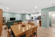  21 Silvereye Street Kealy WA 6280 $425,000 - $435,000 First time offered to the market is this fantastic easy-care living home located in the new Dawson Estate Kealy with schools, shopping centre and medical centre all close by. This cleverly designed residence will impress the most fastidious of buyers with all its extra features and quality fittings adding to the homes energy efficiency.  The heart of the home is the gourmet open plan kitchen which features stone bench tops, a large island bench top, plenty of cupboard space and top quality appliances all overlooking the family and dining area with a triple stacked sliding door opening to the gorgeous paved alfresco enclosed by glass doors and tinted windows for all year entertaining.  Also comprising a spacious master bedroom, deluxe ensuite with hobless shower, well sized other bedrooms with built-in robes, separate theatre room and main bathroom with beautiful free standing bath, ingenious attic storage and more. Other highlights of this home include: â?¢ 	 Beautiful portico entrance with 1200mm feature door with steel mesh security door â?¢ 	 Separate theatre room which could be utilised as a fourth bedroom â?¢ 	 Gourmet kitchen with engineered stone benches, custom glass splashback, overhead  cupboards, Ariston induction cooktop and self-cleaning oven, plumbed fridge recess,  integrated Asko dishwasher. â?¢ 	 Generous master bedroom with 4 door built-in robe and deluxe ensuite with hobless  shower recess â?¢ 	 Good sized secondary bedrooms, both featuring built-in robes  â?¢ 	 Spacious laundry with stone bench tops, linen press and broom closet â?¢ 	 Free standing deep soaking bath in main bathroom â?¢ 	 High ceilings in entry and open plan living â?¢ 	 LED lighting throughout home â?¢ 	 Kelkom home intercom system with video â?¢ 	 Triple stacking door opening to the enclosed alfresco area with tinted windows to  enjoy all seasons â?¢ 	 Double glazed windows all through home with tinted east and west facing windows â?¢ 	 High quality insulated blinds for added comfort â?¢ 	 Noise reducing solid core doors to all rooms â?¢ 	 Low maintenance gardens with extensive use of travertine pavers around home â?¢ 	 Double insulation in roof â?¢ 	 Extra storage space in ceiling with mezzanine flooring, light and power point via attic  loft ladder located in garage â?¢ 	 Energy efficient Stieble Eltron heat pump hot water system â?¢ 	 Extra high double garage with shoppers entrance With a well-considered floor plan & modern features, all you would need to do is add your own finishing touches to make this your home. Contact Richard Krikken today for an exclusive inspection that wonâ??t disappoint! 