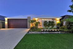  10 Gamin Vista, Aveley WA 6069 $499,000 WHY BUILD when this AMAZING 4 bedroom 2 bathroom FAMILY HOME offers such a great alternative! With all the hard work already done together with it presenting like new and being of a display home standard, you would be crazy not to consider or at the very least view this IMPRESSIVE RESIDENCE. Aveley Primary School is super handy and you'll also enjoy the benefits of being within walking distance to the Shopping Centre, Medical Facilities, a BEAUTIFUL lake and parklands as well as the prestigious Swan Valley Anglican School. There's also quick and easy access onto Gnangara Road, your starting point when going to work or visiting the many Swan Valley Wineries and Restaurants. The home itself is immaculate and includes: • 	 Feature 1200mm entrance door • 	 Impressive entry hall with recessed ceiling and picture recess • 	 Master bedroom with large walk in robe • 	 Ensuite with double vanity and separate toilet • 	 Open theatre or lounge room • 	 Large open plan living area (kitchen/meals/family) with high ceilings • 	 Galley kitchen with lots of cupboard space and stone benchtops • 	 3 good size minor bedrooms all with double mirrored robes • 	 Activity area/study. A perfect hideaway for the kids • 	 Ducted and zoned reverse cycle air conditioning • 	 Quality fixtures and fittings including shutters throughout The UNIQUE alfresco is centrally located and really feels like that perfect indoor/outdoor room. With its aggregate floor and ceiling fans it overlooks the designer garden, the perfect spot for that family barbecue. Boasting almost 200sqm of internal living area (not including the alfresco or portico) as well as a floor plan that offers room for all the family this well located home is certain not to disappoint! Call Scott now on 0433 693 113. 
