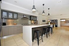  15 Brandalier Turn, Aveley WA 6069 $529,000 - $539,000 This spacious, quality-built Dale Alcock home with its triple garage is looking for a new owner and is located on a quiet Aveley street. With great street appeal and all of the "I Wants" that a family needs, this property is sure to be popular and viewing is a must to appreciate what is on offer.  Some of the features of this modern home include:  • 	 A large master bedroom with quality fixtures, fitted his and hers robes and direct access to a private courtyard.  • 	 The resort style ensuite has double vanities as well as a spa bath.  • 	 The kitchen comes complete with Essa stone, a 900mm cooktop and oven, glass splash back, dishwasher, double fridge recess and modern lighting.  • 	 The meals and family room are generous in size and there is a separate theatre room with double doors for privacy and the option to install a projector.  • 	 The study is close to the front of the house so an ideal space to work from home.  • 	 Bedrooms 2, 3 and 4 will hold a queen size bed and have ample robe storage.  • 	 The functional laundry room has a triple linen cupboard.  • 	 There is ducted reverse cycle air-conditioning as well as a security alarm on offer.  • 	 The outdoor entertaining area is substantial with a decked alfresco complete with a ceiling fan and gas point as well as a flat patio.  • 	 The triple garage has a roller door to the back gardens enabling easy access. This stunning home has raised ceilings throughout the living area adding to the feeling of spaciousness. With a block size is 666m2 and total property size of 317m2, there is room to move inside and out. Call CLAIRE HUGHES from ER REALTY on 0412 014 336 to view this property today! 