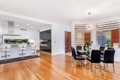 30 Azzurra Dr, Varsity Lakes QLD 4227 $1,545,000 Varsity Lakes finest home architecturally designed, this stunning 60 square home displays meticulous attention to detail. With an array of superior finishes, this home features 5 lavish bedrooms, each appointed like a master suite, fully fitted study upon entry, state of the art wireless theatre room, spacious living and brilliantly designed retreat areas, a high-tech security system that is simple to use plus many other extras.  This beautifully appointed home was built in 2009, presents as new and showcases... • 	 The ultimate chef's Miele kitchen, including Caesar stone bench tops, induction cooker, 3 ovens, 3 warmer drawers, integrated coffee machine and dishwasher, fridge/freezer and electrically height adjusted rangehood. • 	 3 ensuites, 1 two way bathroom, plus powder room • 	 Magnificent Theatre Room - wireless technology  • 	 Master bedroom suite; electric blinds, spa bath  • 	 Alfresco covered outdoor area with 5 burner BBQ • 	 Spectacular pool with gas heated spa  • 	 Solar hot water  • 	 Underground 5000 litre water tank • 	 Vacuum system & Ducted air conditioning FEATURES Air Conditioning  Pool 