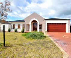  8 Manila Way, Aveley WA 6069 $529,000 PRICE REDUCED!!! Perfectly positioned in the heart of a prestigious private estate and close to shopping, transport, medical centres, schools, parks, sporting grounds and nature reserve, this 4 bedroom 2 bathroom home is just a short drive from the Swan Valley with all that this lifestyle offers. The double front doors open to a beautiful porcelain tiled foyer giving entry to the home theatre, family living and bedrooms areas. The massive down-lit kitchen is every chef's dream with granite bench tops, double sink, stainless steel range hood, 900mm oven and 5 burner cook-top, dishwasher, microwave recess, pantry and an abundance of cupboards, pot drawers and storage. Centrally located, it overlooks the expansive dining and family living area which opens to the outdoor alfresco via Bi-fold doors. The three extra-large minor bedrooms, complete with built in robes, are only eclipsed by the huge master bedroom with its walk in wardrobe and beautifully tiled ensuite with "his and hers" vanities and separate toilet. The massive 6.5 x 6 metre garage with remote control door has the added features of extra height and rear roller door for drive through parking for extra vehicle, trailer, boat etc. Additional features include: *Great sized 672sqm block *Super high ceilings throughout *Reverse cycle air-conditioning *Tiled entrance with down lights and wooden ceiling *Double door tiled entrance with chandeliers *Separate lounge/theatre with European style pillars and carpet *Massive kitchen with double fridge recess and split system air con *Good size dining room with feature dome ceiling opening onto alfresco via by-fold doors *Family room with built in quality tv cabinet *Three good size minor bedrooms, all with sliding built in robes *Master suite with walk in robe *Ensuite with double basin, large shower and separate toilet *Good size laundry with built in cupboards *Quality porcelain tiles and downlights throughout living areas *Tiled alfresco with wooden ceiling, ceiling fan, down lights and bbq *Double garage with extra height ceiling with rear roller door *Drive through access *Security alarm and security screens *Fully reticulated lawns and gardens For more information or for your opportunity to secure this home, please call Jef Baker now. 